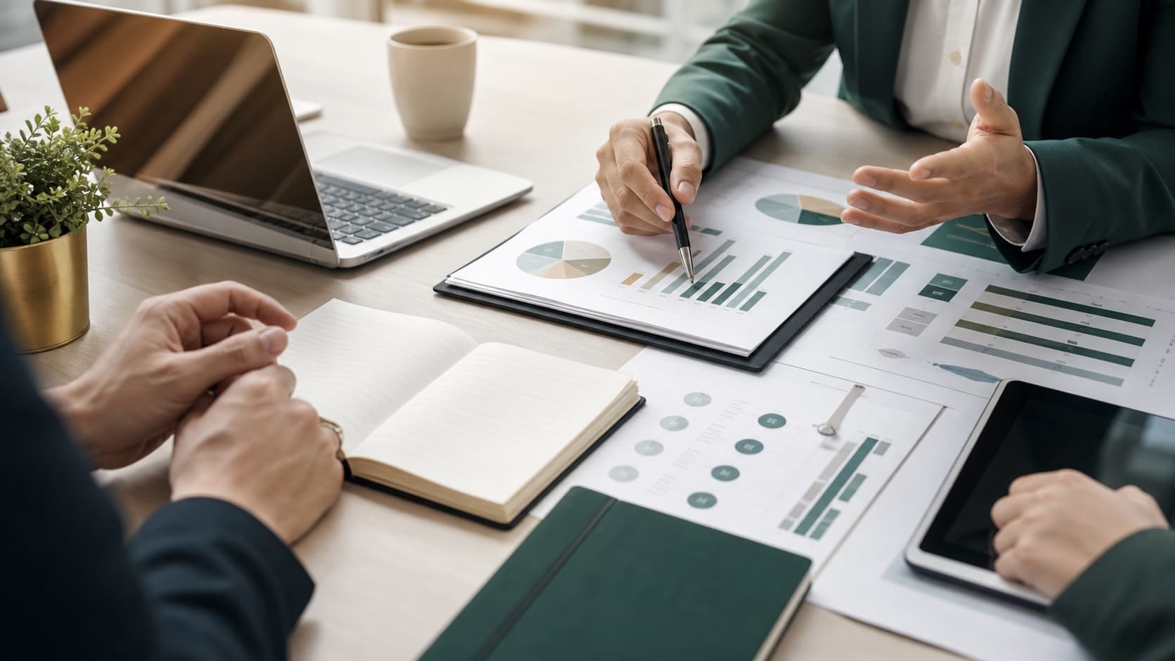 Business planning workspace with charts, notes, and strategy materials